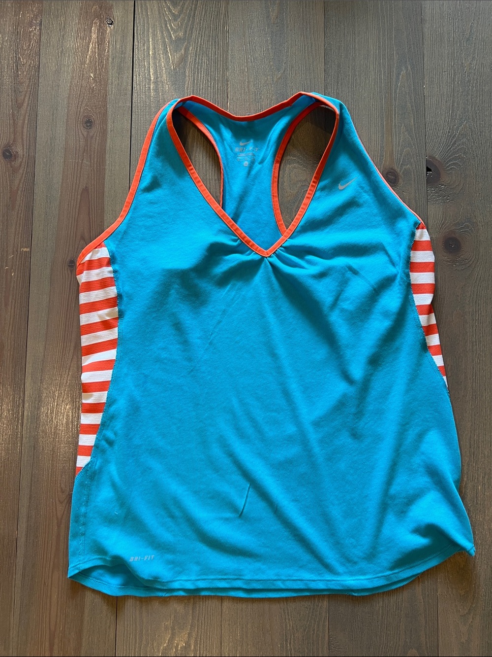 Nike dri fit athletic tank. Turquoise with orange side stripes. XL